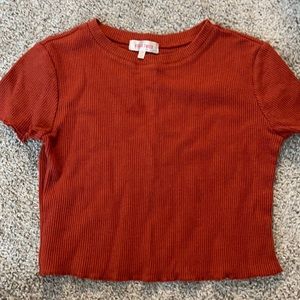burnt orange ruffle edges crop top